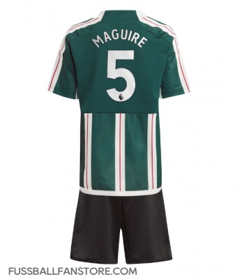Manchester United Harry Maguire #5 Replik Auswärtstrikot Kinder 2023-24 Kurzarm (+ Kurze Hosen)